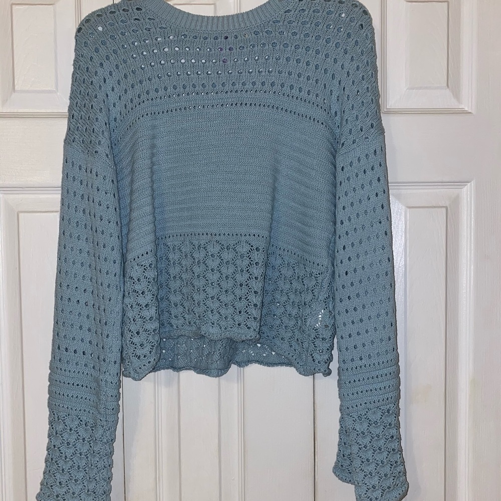Holey sweater